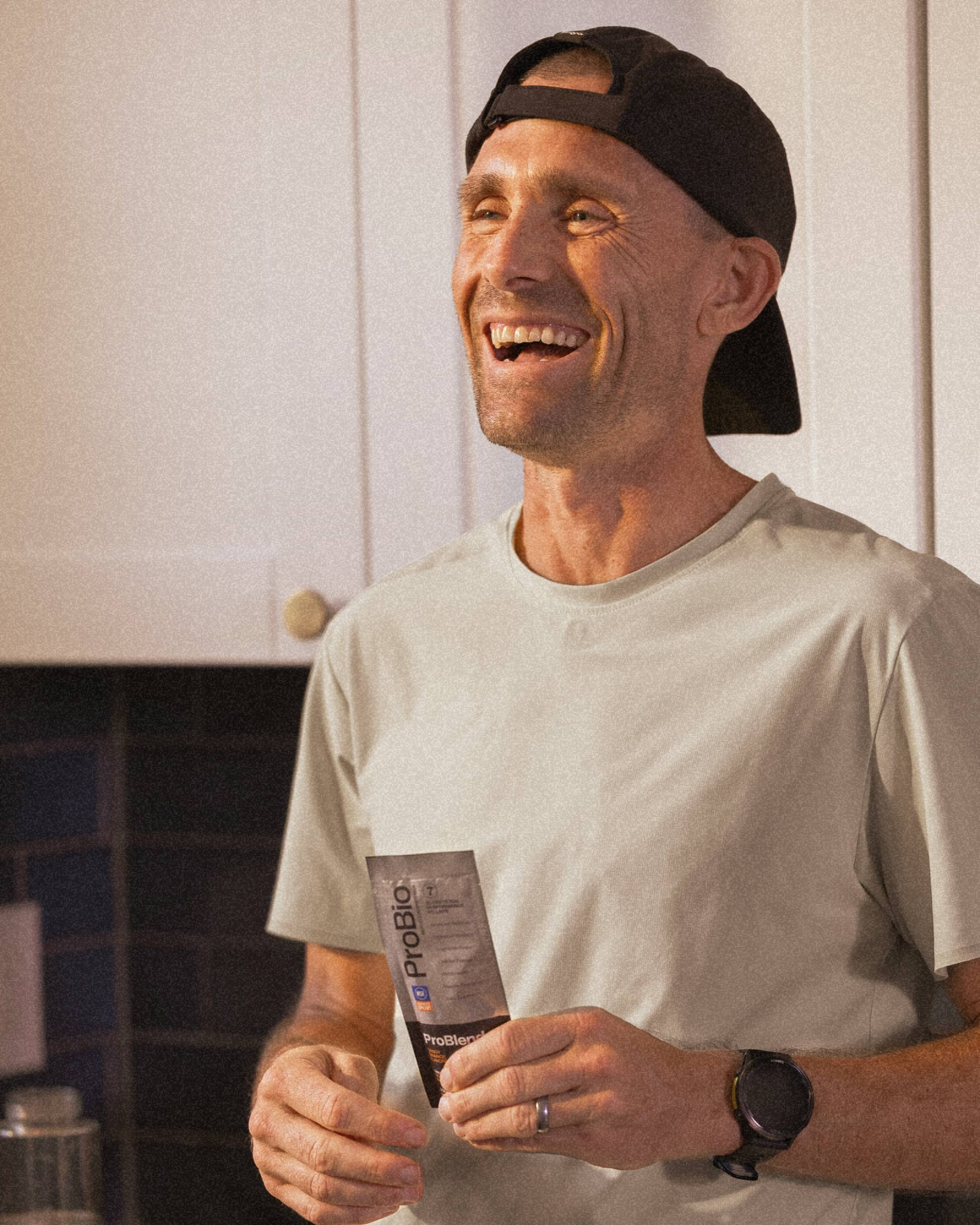 Zach Bitter smiling, holding ProBio